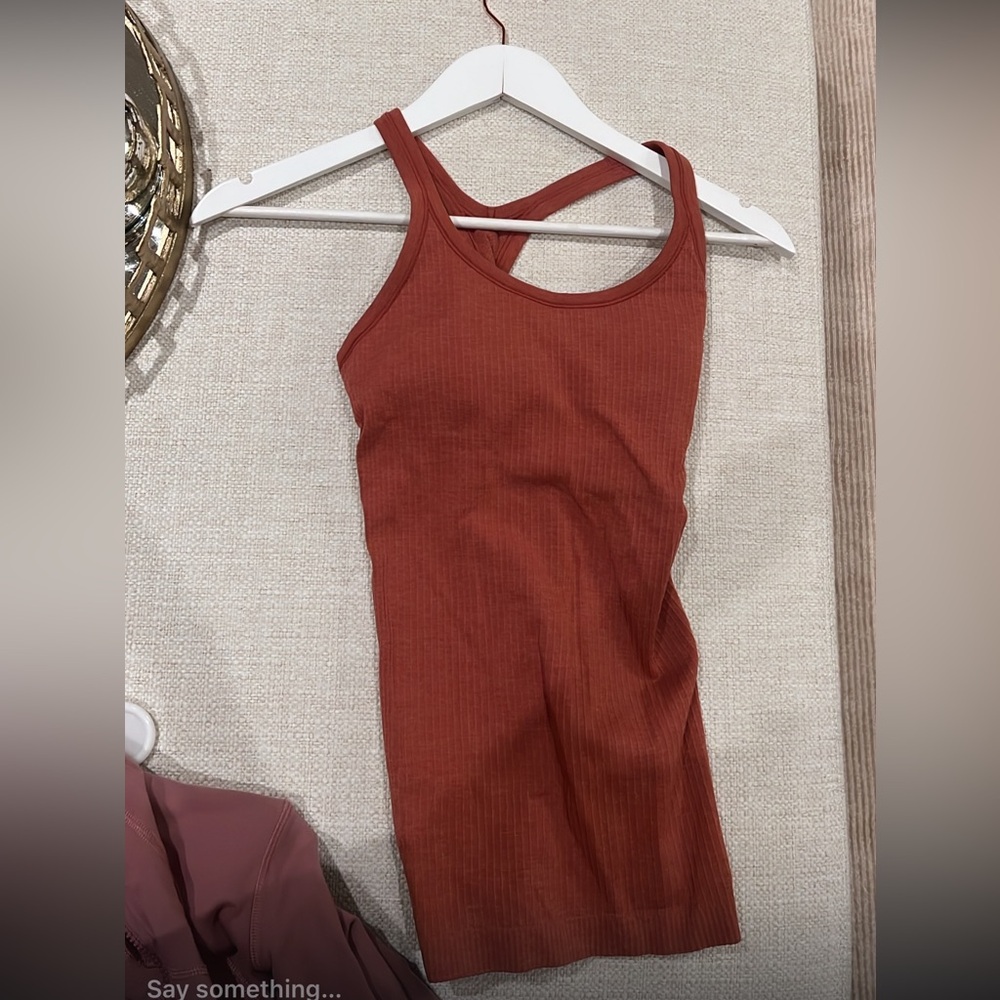 SOLD Lulu lemon Ebb to street tank size 4